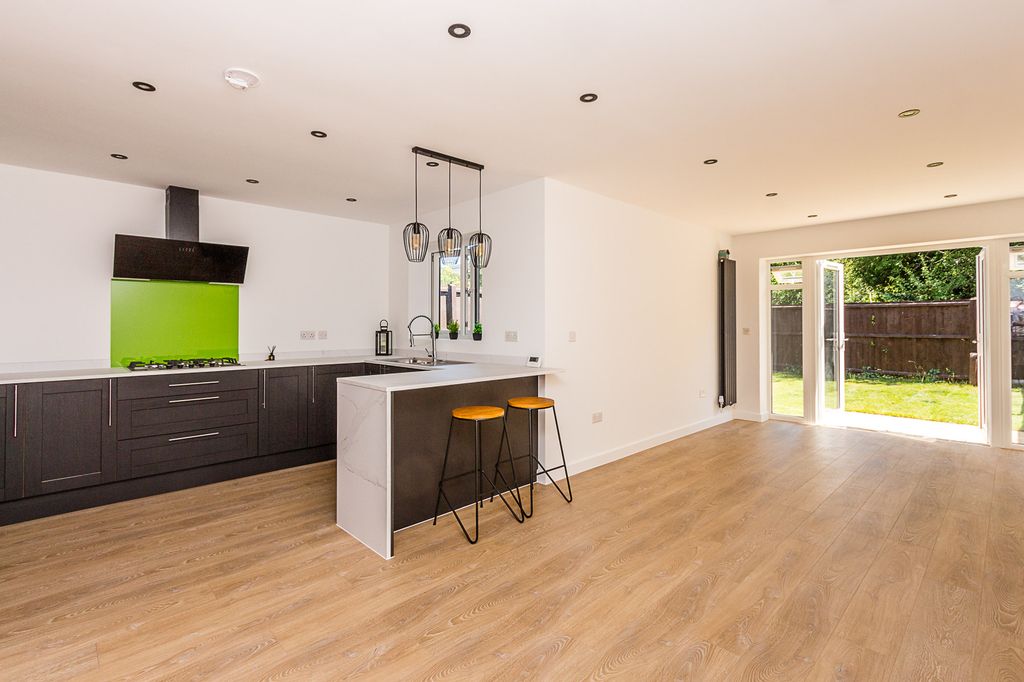 Property photo 2 of 15 Kitchen/Dining/Family Room