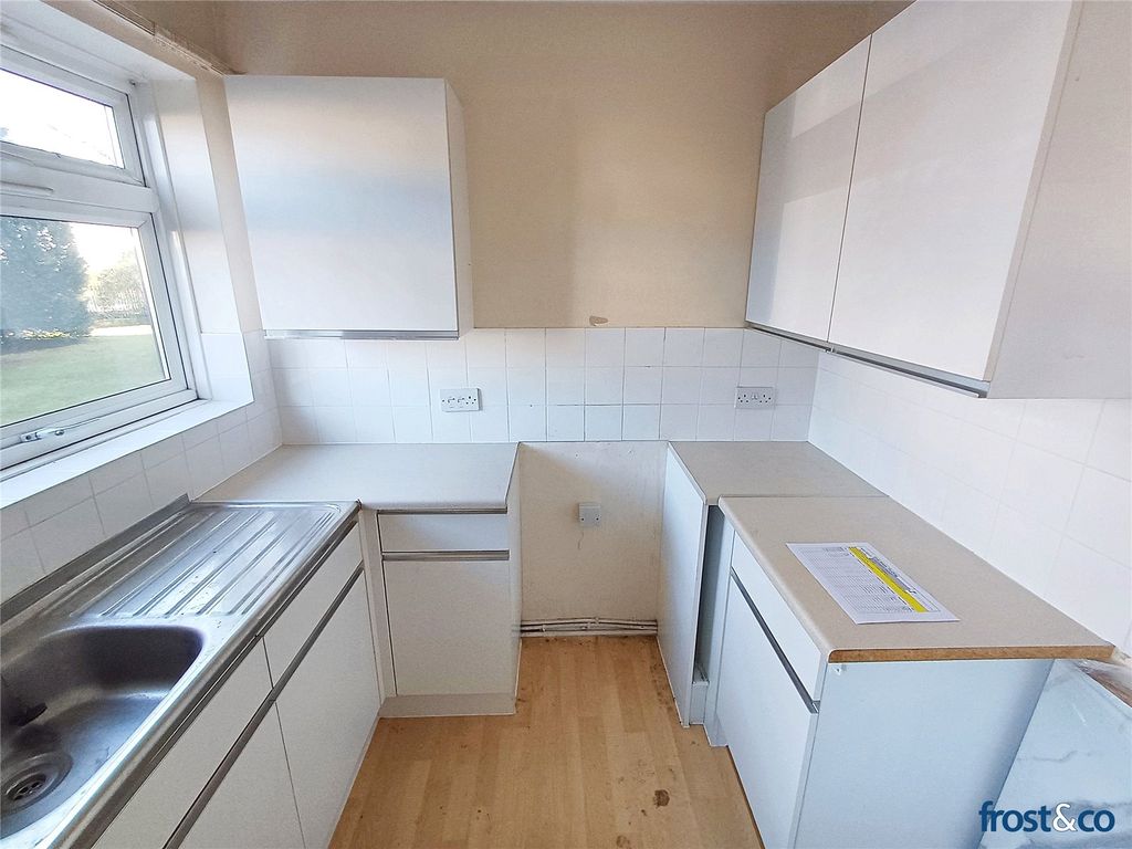 Property photo 3 of 8 Kitchen
