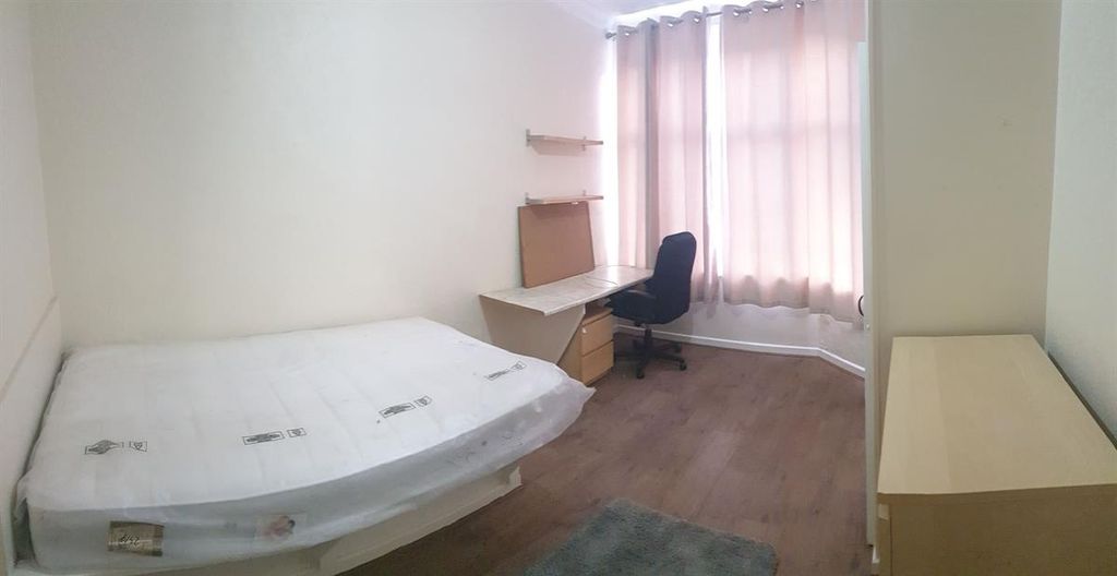 Property photo 2 of 9 Bright, Simply Furnished Bedroom With A Double Bed...