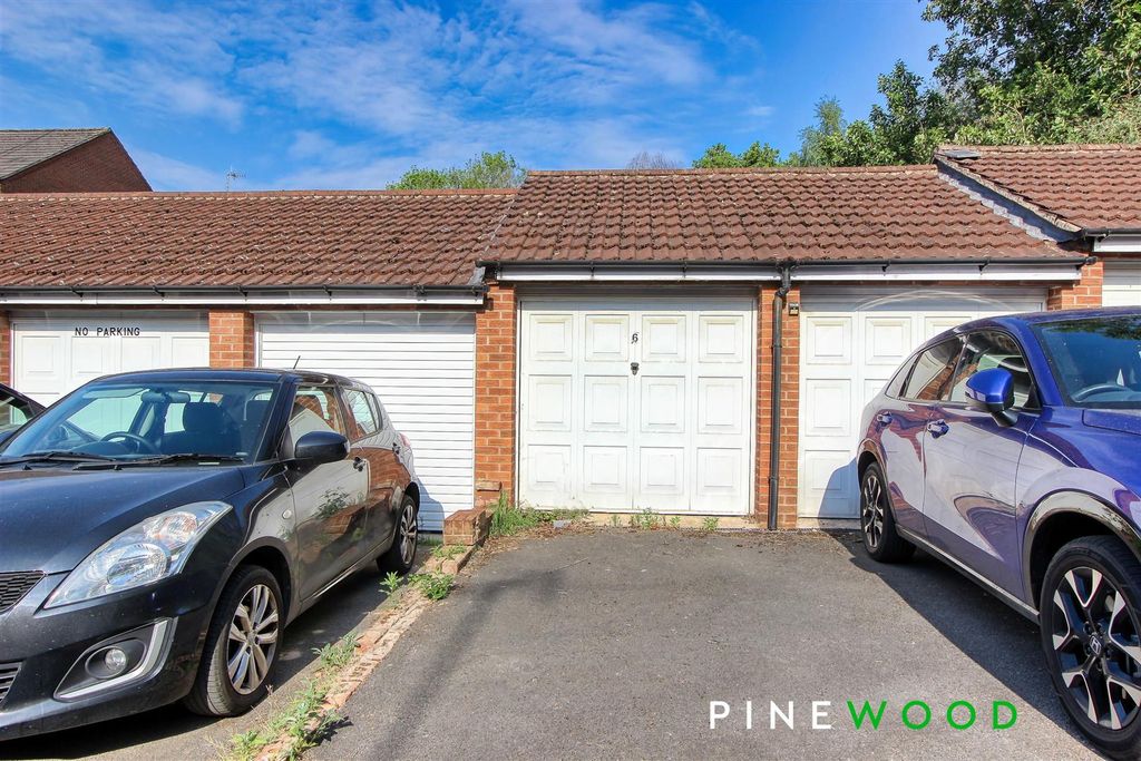 Property photo 2 of 18 Garage And Driveway