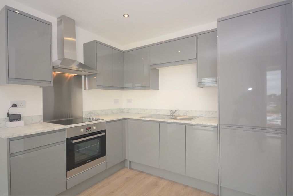 Property photo 3 of 8 Kitchen Area