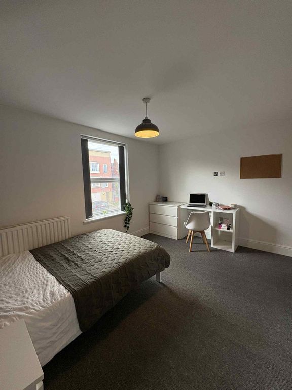 Property photo 2 of 14 Bright And Clean Bedroom Featuring A Comfortable B...