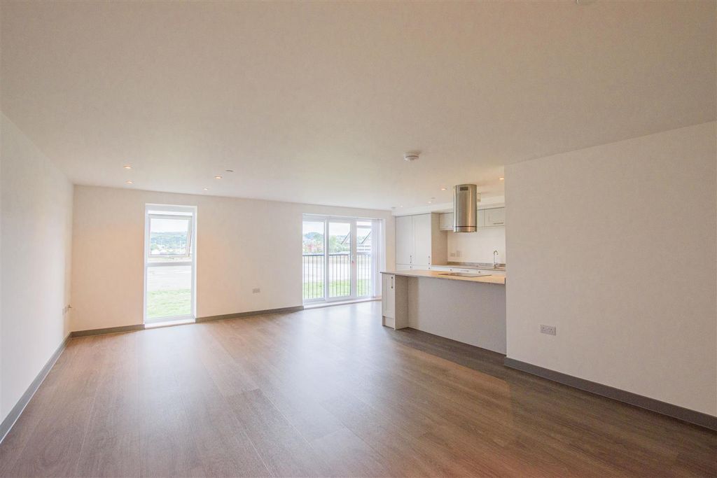 Property photo 3 of 12 Kitchen/Dining/Living Room
