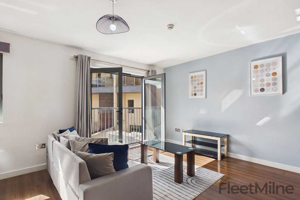 Property photo 2 of 15 Living Area