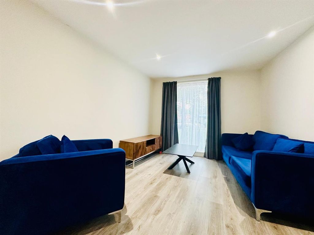 Property photo 2 of 11 Living Area