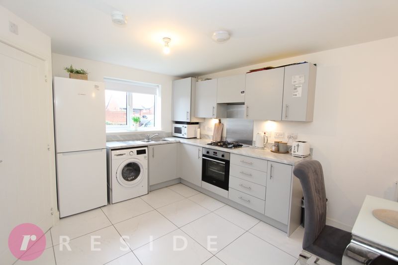 Property photo 3 of 13 Dining Kitchen