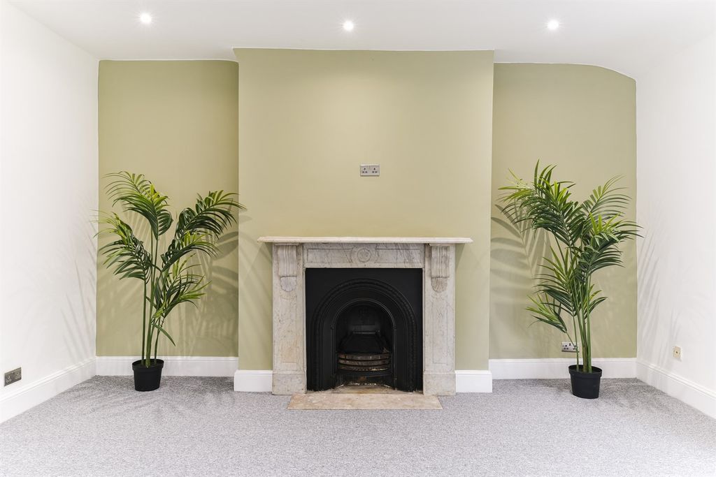 Property photo 3 of 9 Fireplace