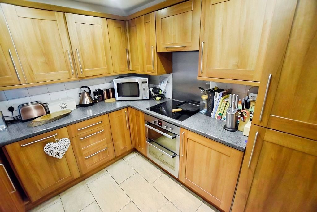 Property photo 2 of 11 48748E22-Kitchen 201