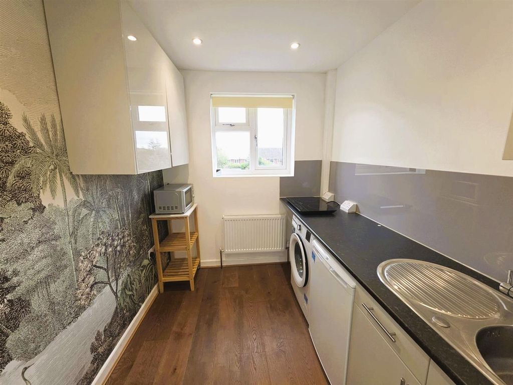 Property photo 2 of 6 Kitchen Area