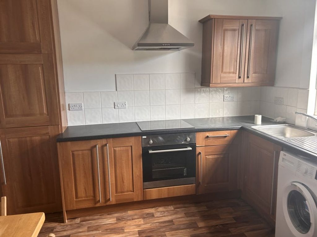 Property photo 2 of 9 This Charming Kitchen Features A Warm Wooden Cabin...