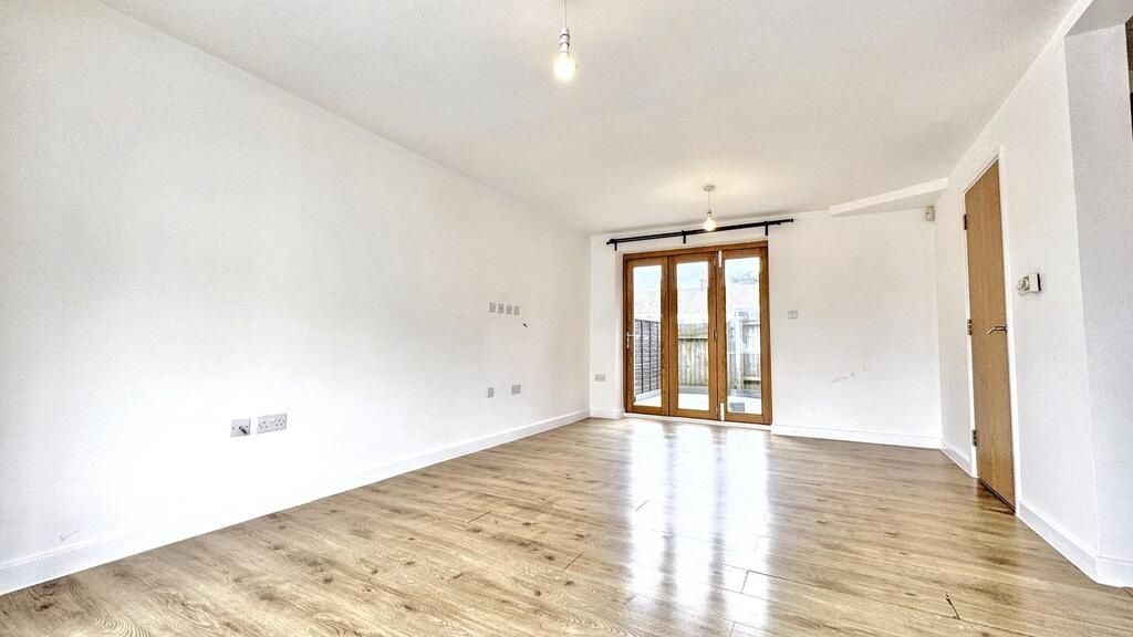 Property photo 3 of 15 Bright Open-Plan Living Area With Wood Floors...