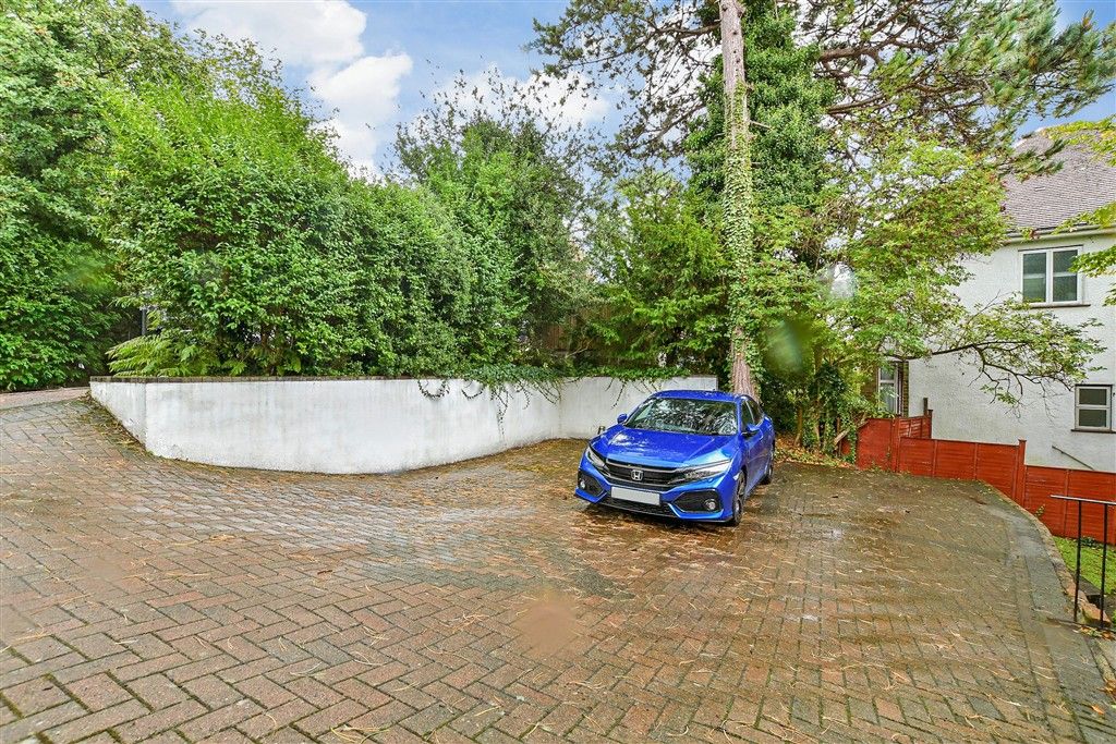 Property photo 2 of 11 Driveway *