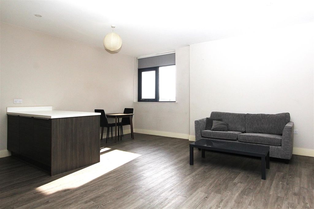 Property photo 1 of 7 Spacious Open-Plan Lounge With Modern Flooring...