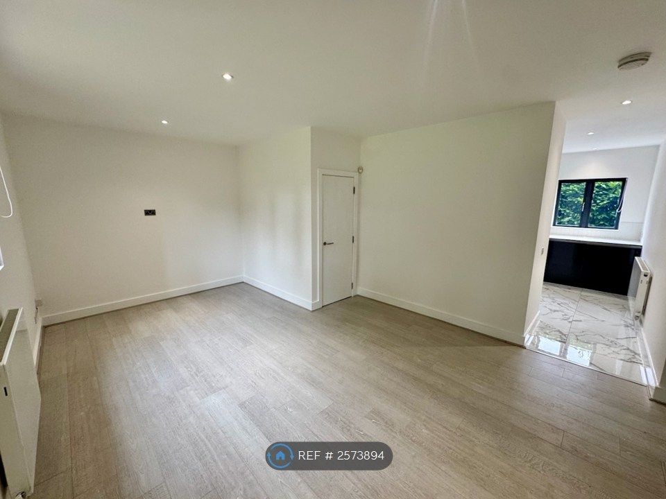 Property photo 3 of 9 Living Area