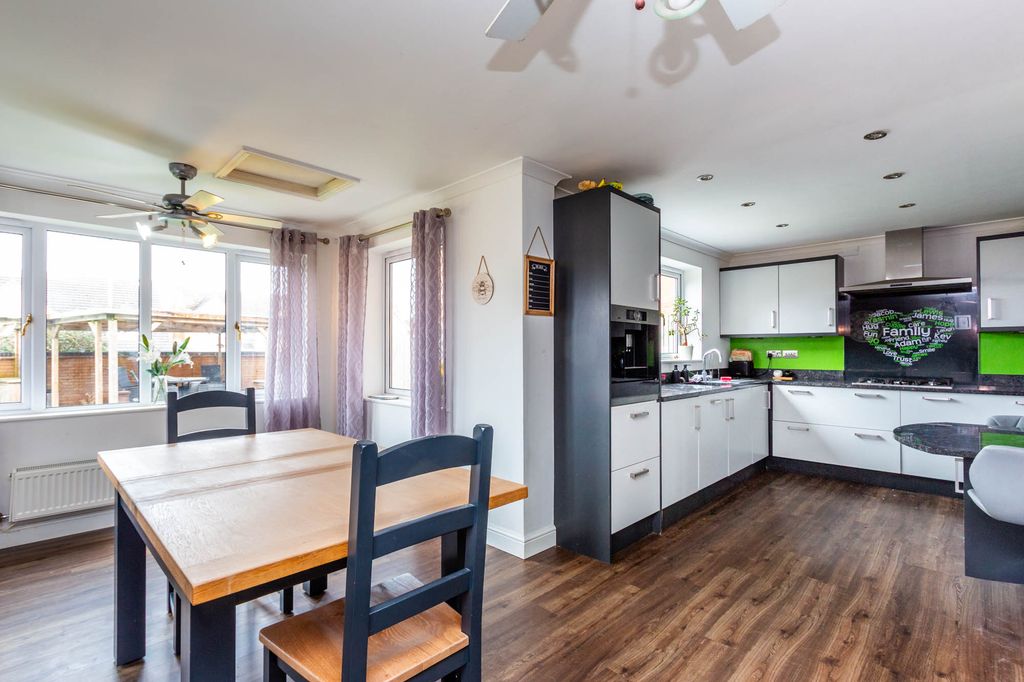 Property photo 2 of 17 Kitchen/Dining/Family Room