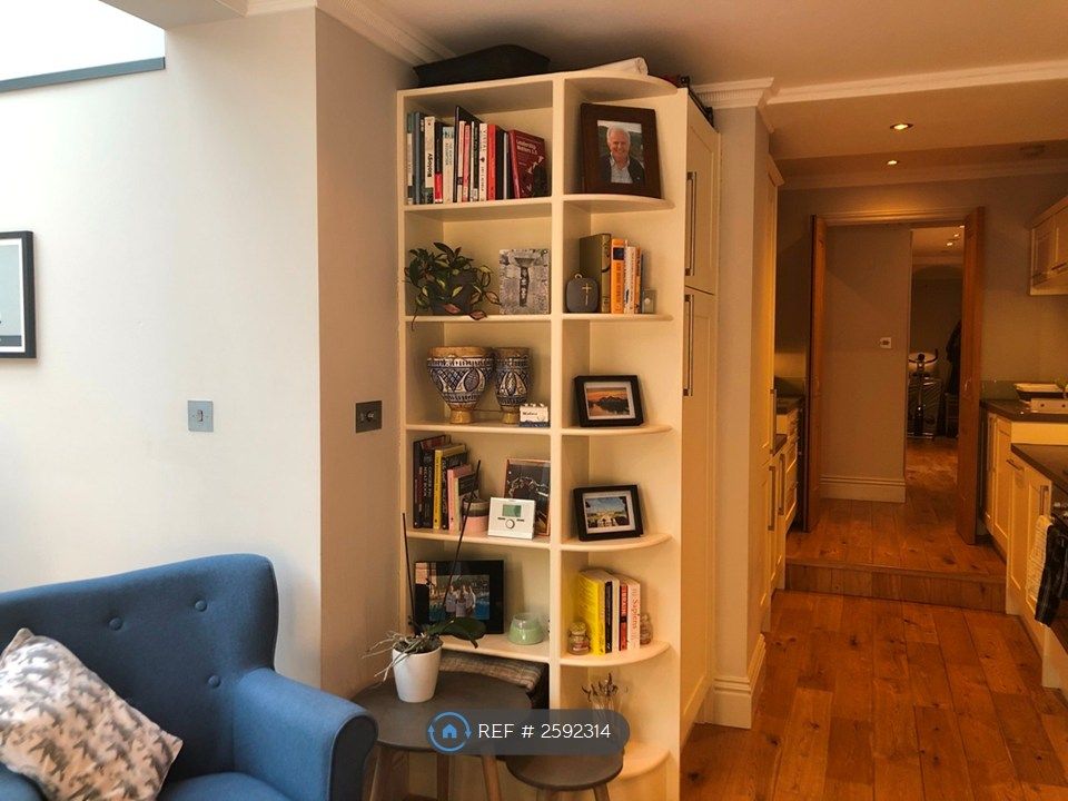 Property photo 3 of 17 Living Area Leads To Kitchen