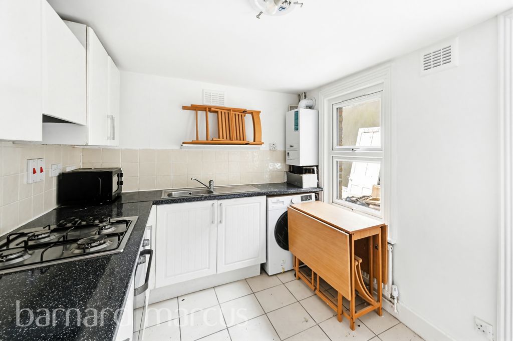 Property photo 1 of 8 Kitchen