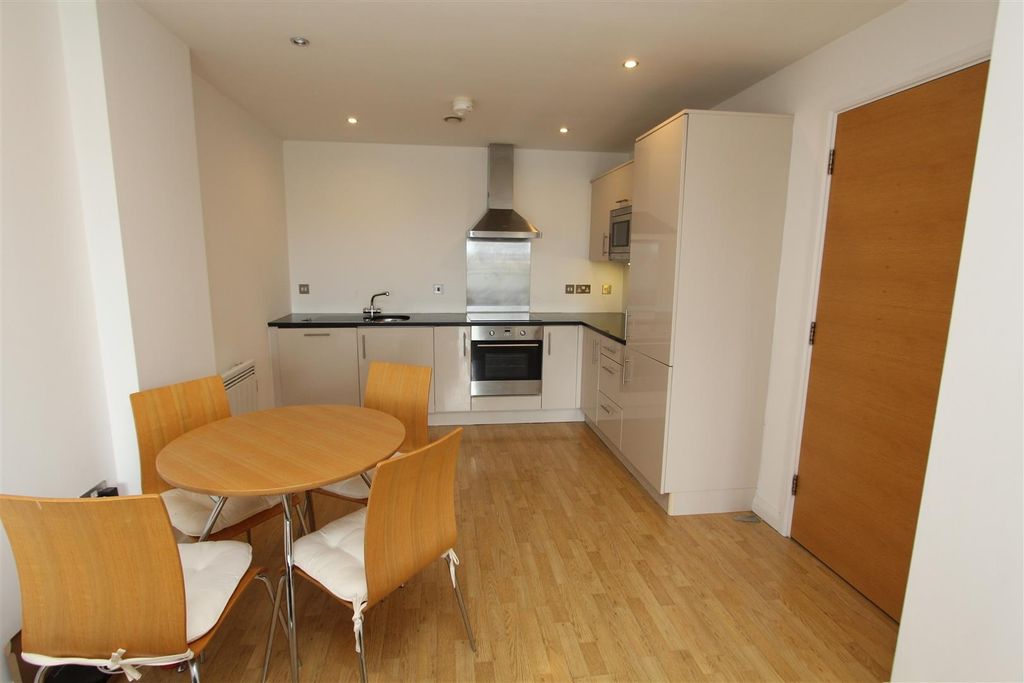 Property photo 2 of 10 Sleek Modern Kitchen With Stylish Dining Area...