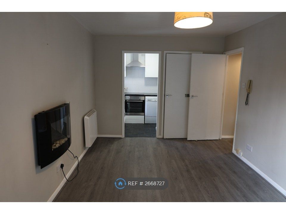 Property photo 3 of 22 Living Area Opens To Kitchen