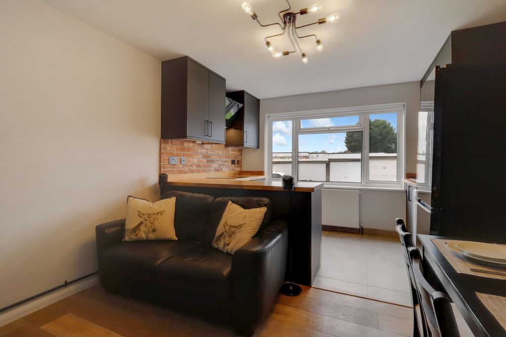 Property photo 2 of 8 Kitchen And Living Room