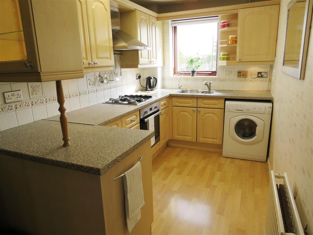 Property photo 3 of 8 Kitchen