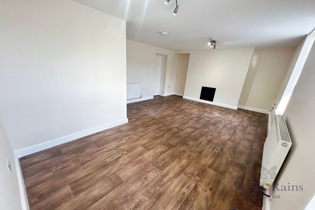 Property photo 3 of 8 Living Room