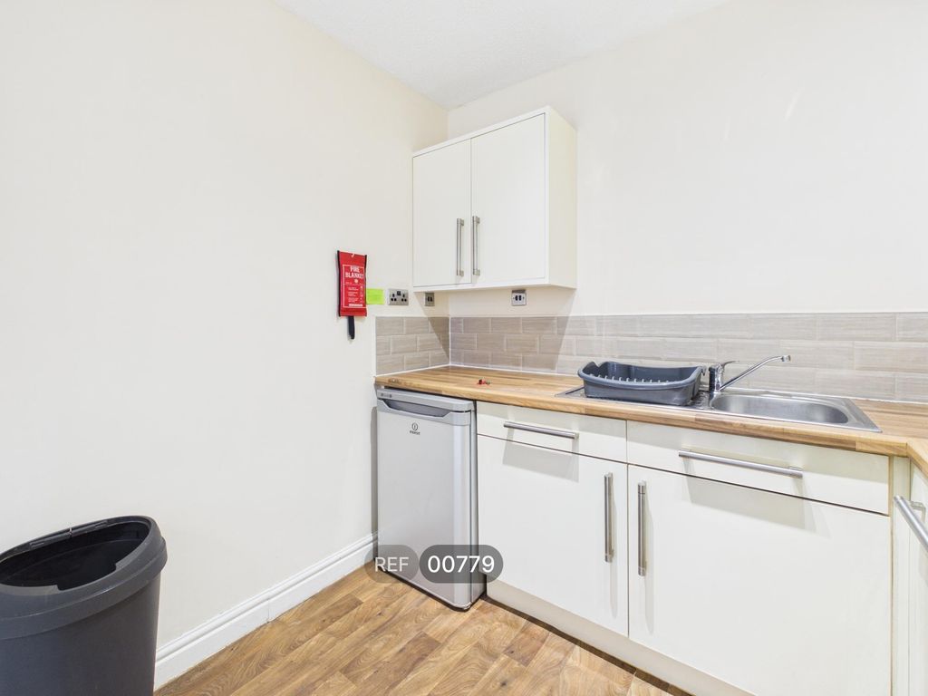 Property photo 2 of 19 Kitchen & Living Area