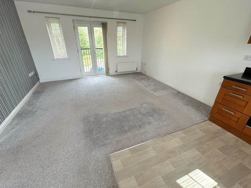 Property photo 3 of 11 Living Area