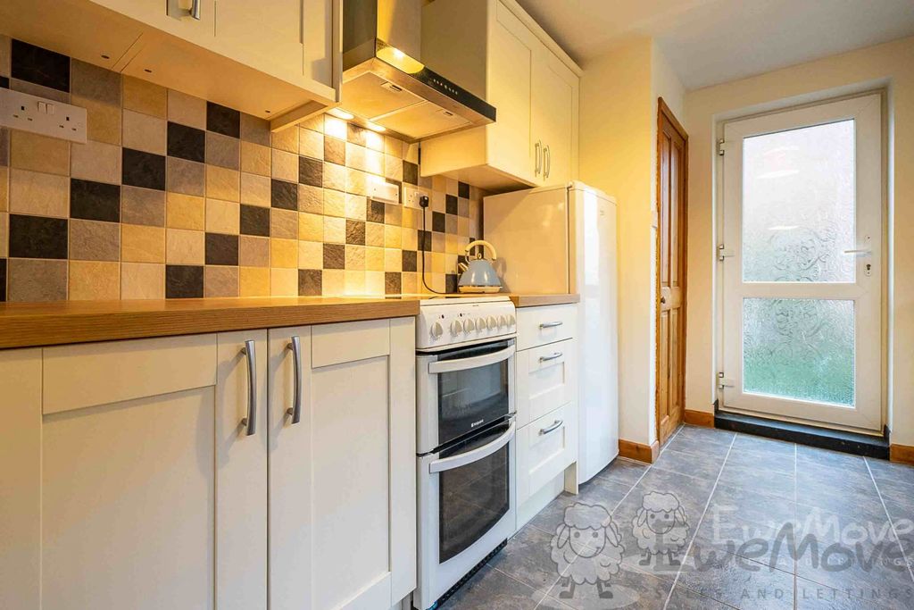 Property photo 2 of 12 Kitchen