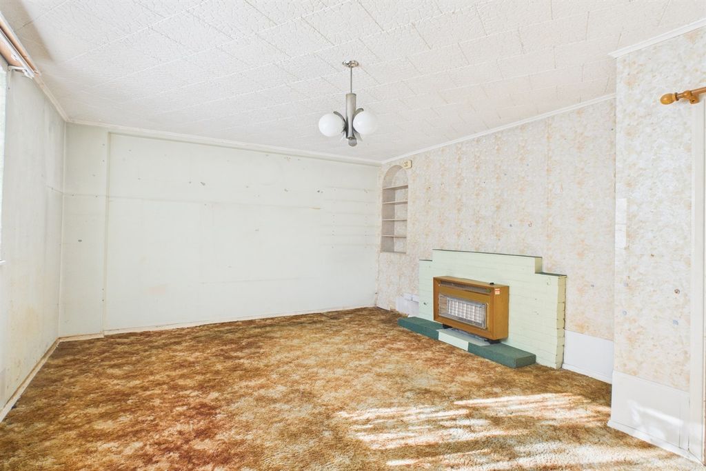 Property photo 1 of 11 Living Area