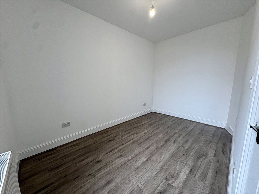 Property photo 2 of 12 Living Room