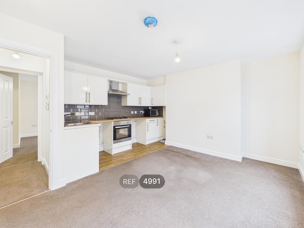 Property photo 2 of 8 Kitchen/Living Area