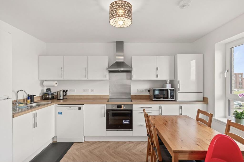 Property photo 2 of 12 Kitchen