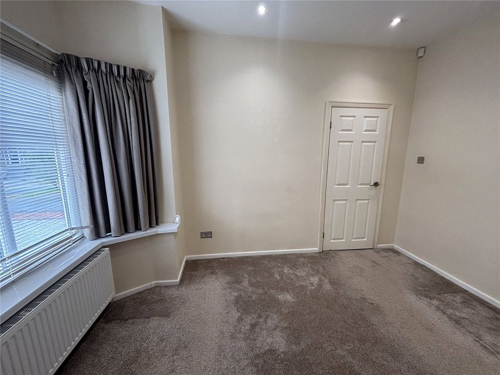 Property photo 3 of 15 Front Room