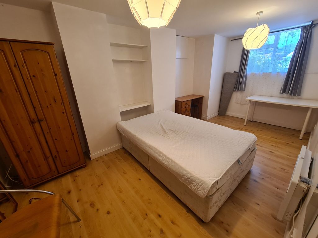 Property photo 3 of 20 A Bright And Tidy Bedroom Featuring A Comfortable ...