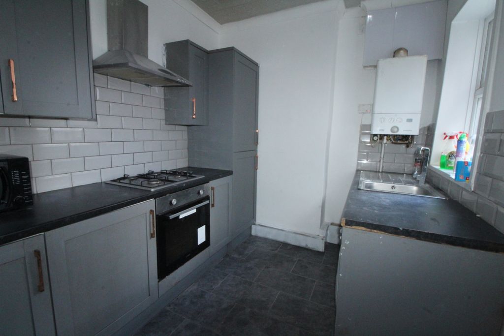 Property photo 3 of 13 Kitchen