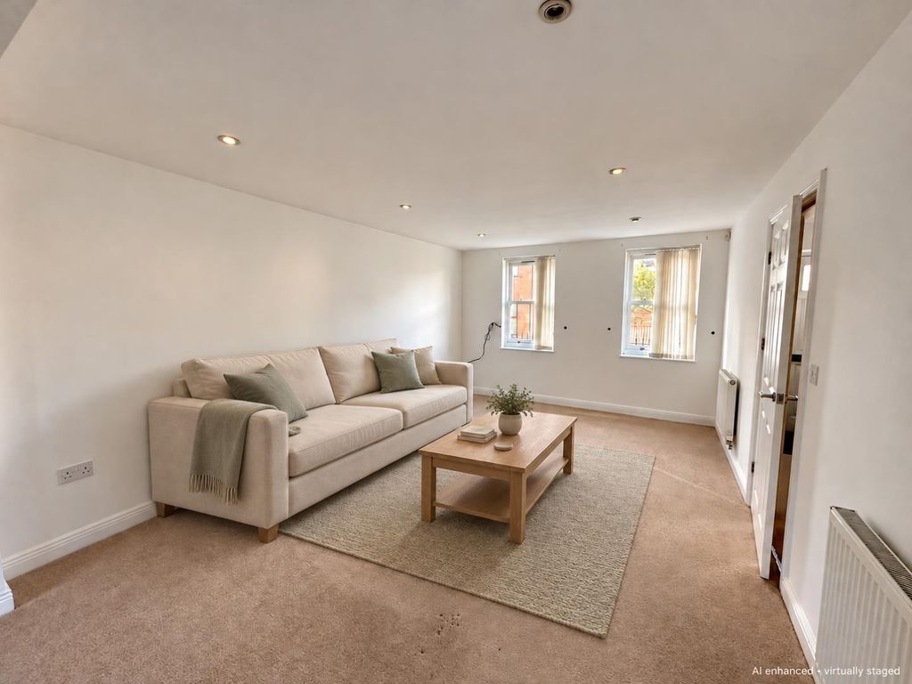 Property photo 2 of 10 Modest British Living Room Staging-1.Png