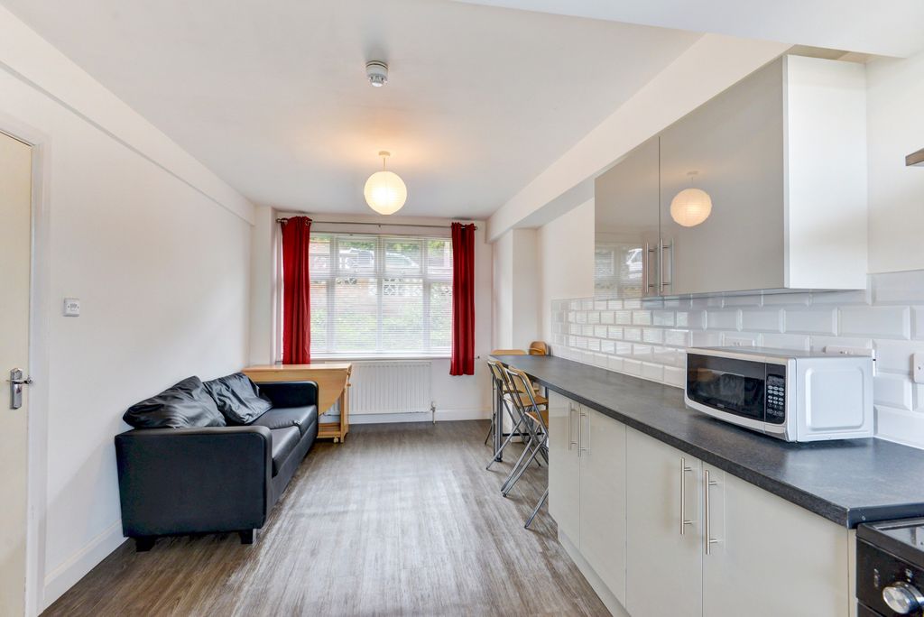 Property photo 2 of 25 Bright Open-Plan Living Area With A Cosy Seating S...