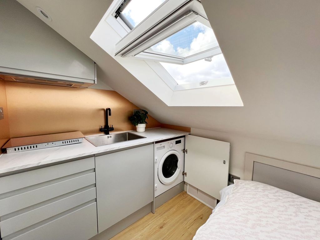 Property photo 2 of 7 Bright And Modern Kitchen Area With A Large Skylig...