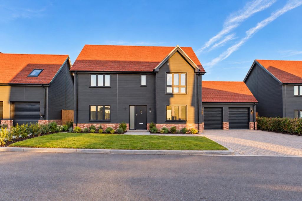 Property photo 1 of 11 Modern Charcoal Home With Recessed Garage.Png