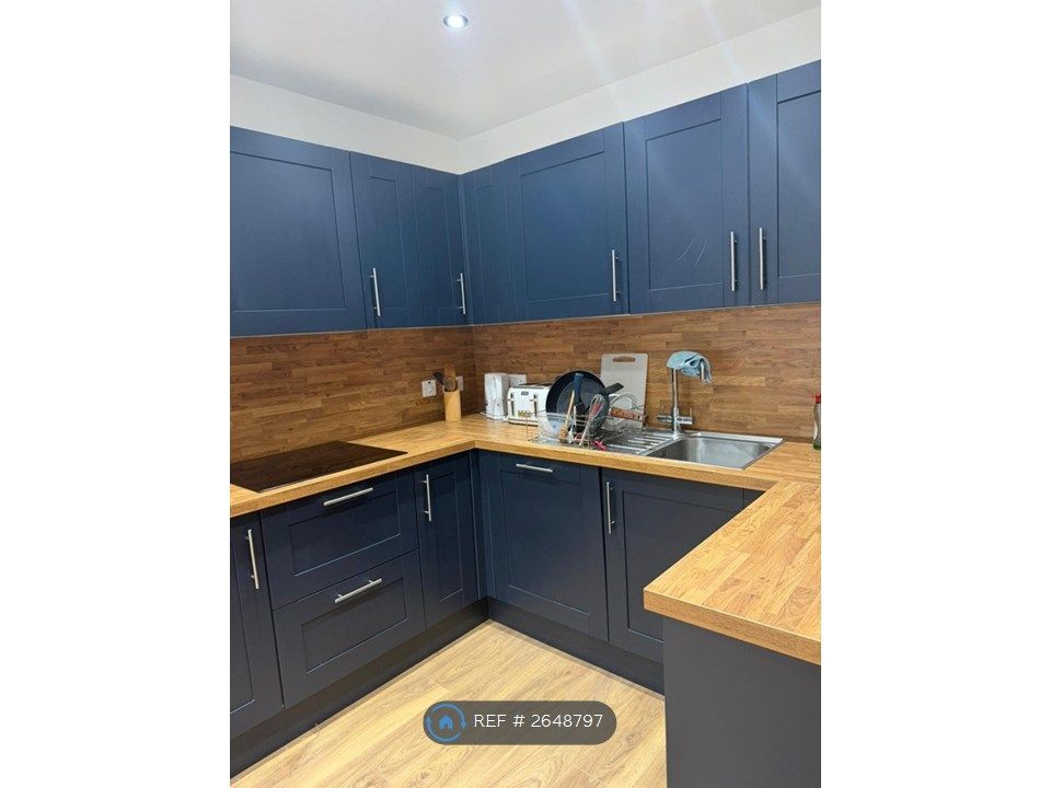 Property photo 2 of 19 Kitchen With Induction Hob And Built In Diswasher