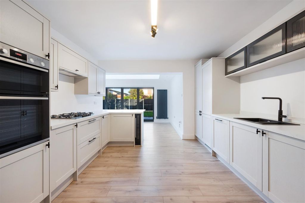 Property photo 2 of 25 Kitchen Opening Into