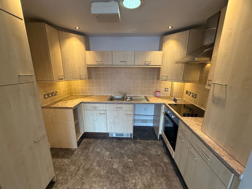 Property photo 3 of 8 Kitchen