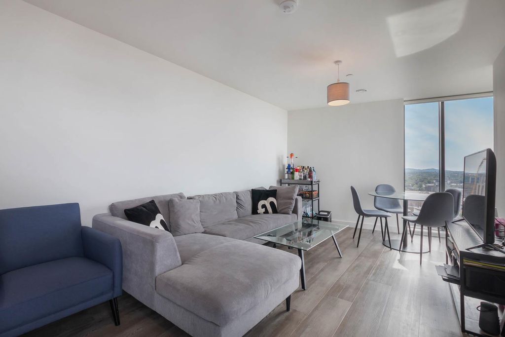 Property photo 1 of 12 Living Area