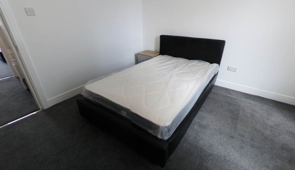 Property photo 2 of 6 A Well-Maintained Double Bedroom Featuring A Comfo...