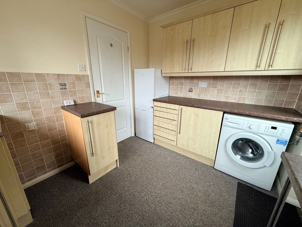 Property photo 2 of 12 Kitchen