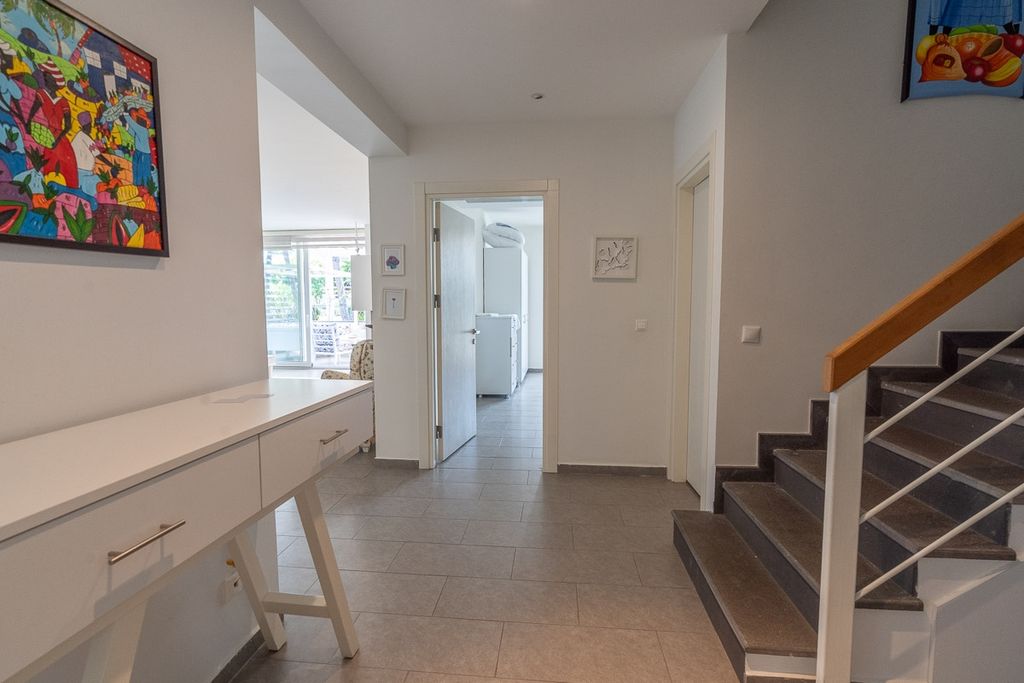Property photo 3 of 19 A Seafront Duplex Apartment For Sale In Fethiye - Entrance Hallway
