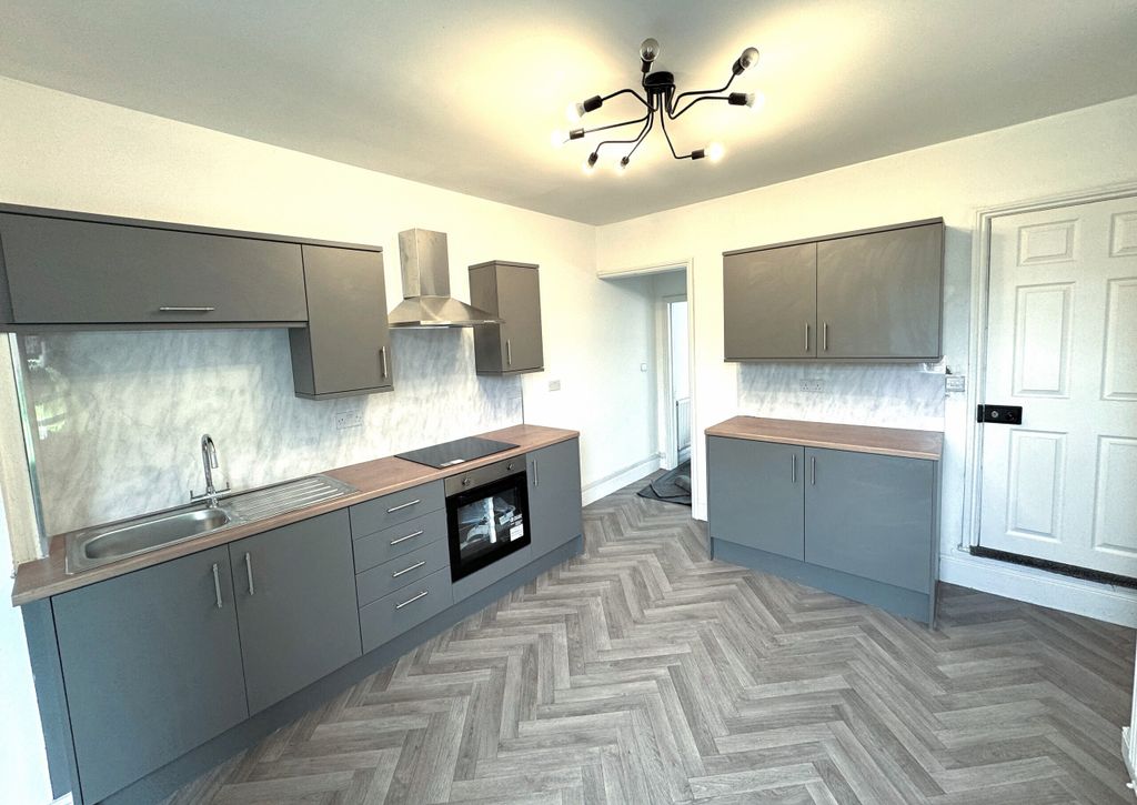 Property photo 1 of 8 Kitchen