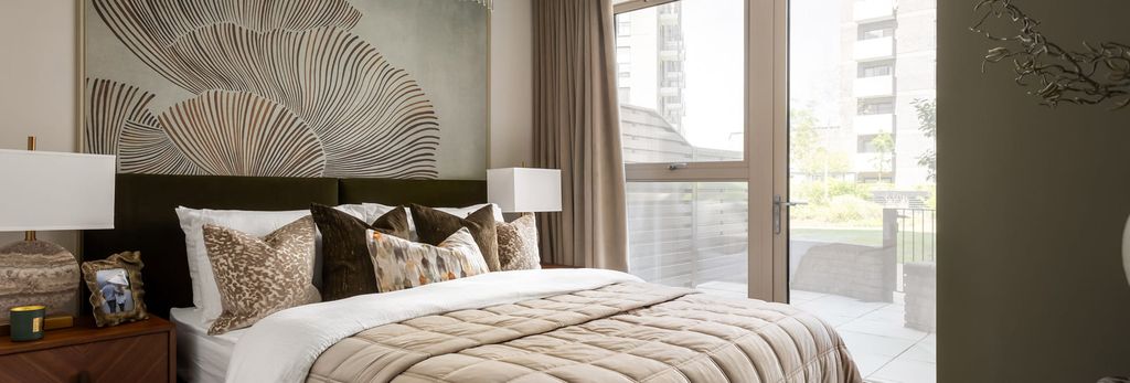 Property photo 2 of 5 Double Bed With Contemporary Design, Bedside Tables And Wall Hanging.