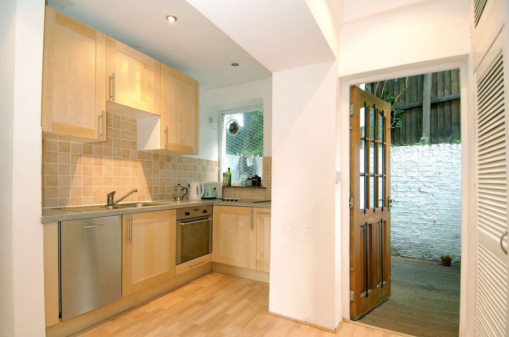 Property photo 2 of 8 Kitchen